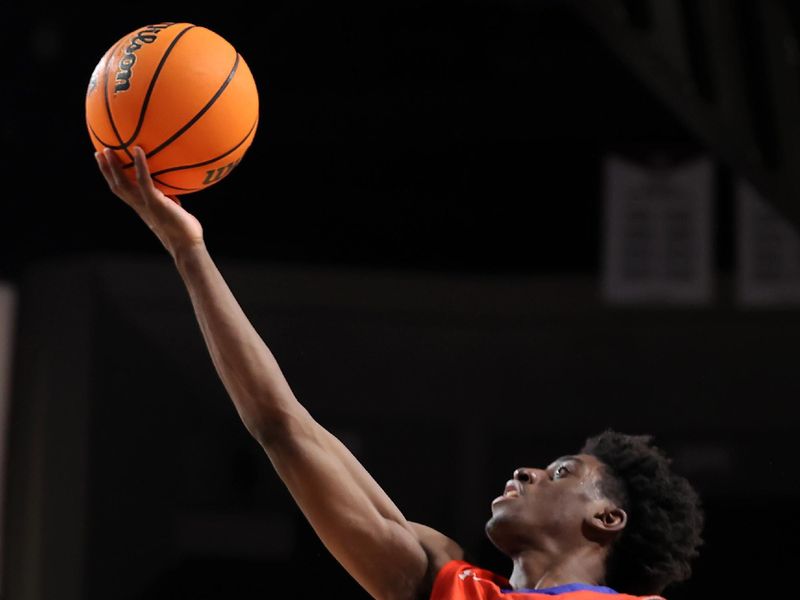 Dec 22, 2023; College Station, Texas, USA; Houston Christian Huskies guard Marcus Greene (10) takes a layup against the Texas A&M Aggies during the second half at Reed Arena. Mandatory Credit: Erik Williams-USA TODAY Sports