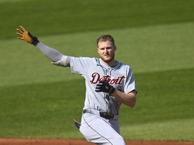 Oct 12, 2024; Cleveland, Ohio, USA; Detroit Tigers outfielder Parker Meadows (22) celebrates double in the second inning against the Cleveland Guardians during game five of the ALDS for the 2024 MLB Playoffs at Progressive Field. Mandatory Credit: David Richard-Imagn Images