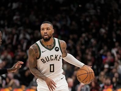 TORONTO, CANADA - NOVEMBER 15: Damian Lillard #0 of the Milwaukee Bucks handles the ball during the game against the Toronto Raptors on November 15, 2023 at the Scotiabank Arena in Toronto, Ontario, Canada.  NOTE TO USER: User expressly acknowledges and agrees that, by downloading and or using this Photograph, user is consenting to the terms and conditions of the Getty Images License Agreement.  Mandatory Copyright Notice: Copyright 2023 NBAE (Photo by Jordan Jones/NBAE via Getty Images)