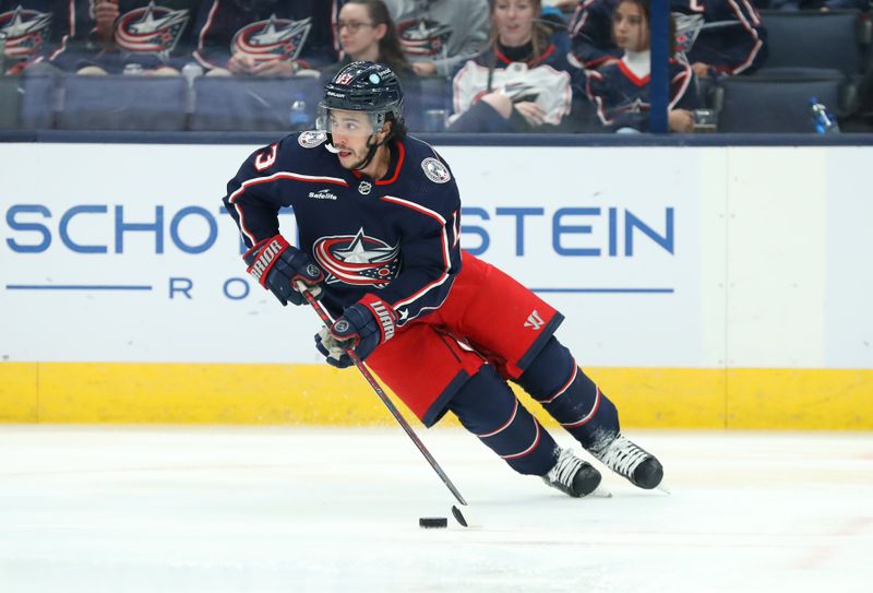 Oct 24, 2023; Columbus, Ohio, USA;  Columbus Blue Jackets left wing Johnny Gaudreau (13) controls the puck during the first period against the Anaheim Ducks at Nationwide Arena. Mandatory Credit: Joseph Maiorana-USA TODAY Sports