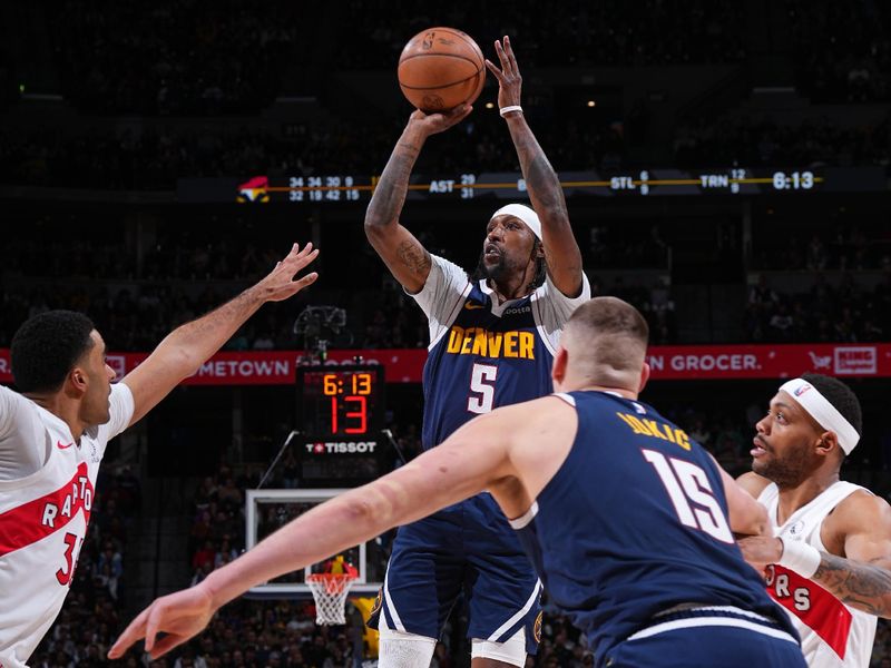 DENVER, CO - MARCH 11: Kentavious Caldwell-Pope #5 of the Denver Nuggets shoots the ball during the game against the Toronto Raptors on March 11, 2024 at the Ball Arena in Denver, Colorado. NOTE TO USER: User expressly acknowledges and agrees that, by downloading and/or using this Photograph, user is consenting to the terms and conditions of the Getty Images License Agreement. Mandatory Copyright Notice: Copyright 2024 NBAE (Photo by Garrett Ellwood/NBAE via Getty Images)