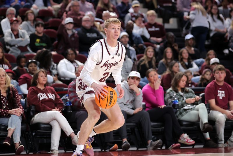 Dec 10, 2023; College Station, Texas, USA; Texas A&M Aggies guard Hayden Hefner (2) handles the ball against the Memphis Tigers during the first half at Reed Arena. Mandatory Credit: Erik Williams-USA TODAY Sports