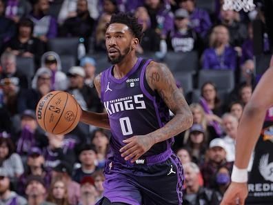 SACRAMENTO, CA - DECEMBER 16: Malik Monk #0 of the Sacramento Kings dribbles the ball during the game against the Utah Jazz on December 16, 2023 at Golden 1 Center in Sacramento, California. NOTE TO USER: User expressly acknowledges and agrees that, by downloading and or using this Photograph, user is consenting to the terms and conditions of the Getty Images License Agreement. Mandatory Copyright Notice: Copyright 2023 NBAE (Photo by Rocky Widner/NBAE via Getty Images)