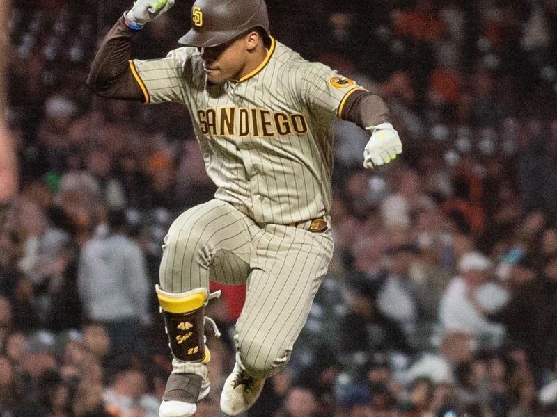 Sep 26, 2023; San Francisco, California, USA; San Diego Padres left fielder Juan Soto (22) jumps in celebration after hitting a home run during the seventh inning against the San Francisco Giants at Oracle Park. Mandatory Credit: Ed Szczepanski-USA TODAY Sports