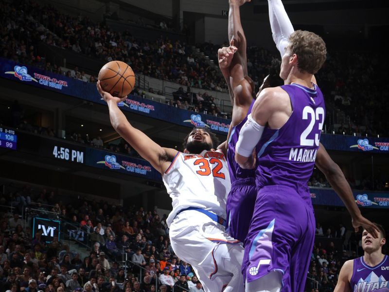 SALT LAKE CITY, UT - NOVEMBER 23: Karl-Anthony Towns #32 of the New York Knicks drives to the basket during the game against the Utah Jazz on November 23, 2024 at Delta Center in Salt Lake City, Utah. NOTE TO USER: User expressly acknowledges and agrees that, by downloading and or using this Photograph, User is consenting to the terms and conditions of the Getty Images License Agreement. Mandatory Copyright Notice: Copyright 2024 NBAE (Photo by Melissa Majchrzak/NBAE via Getty Images)