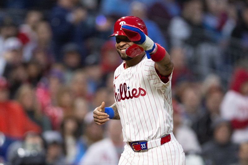 May 15, 2024; Philadelphia, Pennsylvania, USA; Philadelphia Phillies shortstop Edmundo Sosa (33) reacts after scoring on a bases loaded walk during the fifth inning against the New York Mets at Citizens Bank Park. Mandatory Credit: Bill Streicher-USA TODAY Sports