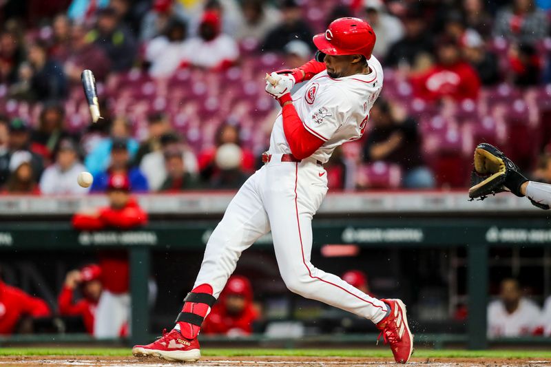 Apr 23, 2024; Cincinnati, Ohio, USA; Cincinnati Reds outfielder Will Benson (30) breaks his bat as he hits a single against the Philadelphia Phillies in the second inning at Great American Ball Park. Mandatory Credit: Katie Stratman-USA TODAY Sports