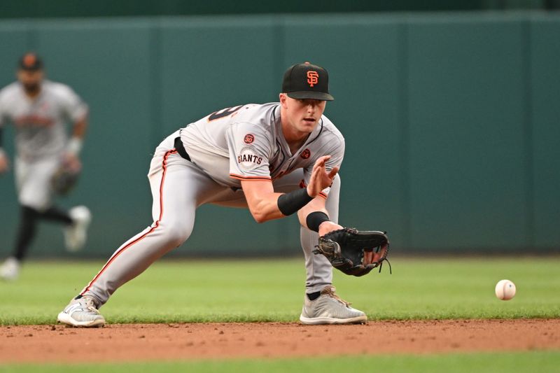 Aug 6, 2024; Washington, District of Columbia, USA; San Francisco Giants short stop Tyler Fitzgerald (49) fields a ground ball against the Washington Nationals during the first inning at Nationals Park. Mandatory Credit: Rafael Suanes-USA TODAY Sports