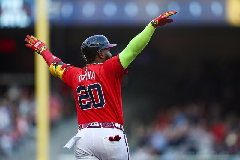 Jun 14, 2024; Atlanta, Georgia, USA; Atlanta Braves designated hitter Marcell Ozuna (20) celebrates after a three-run home run against the Tampa Bay Rays in the first inning at Truist Park. Mandatory Credit: Brett Davis-USA TODAY Sports
