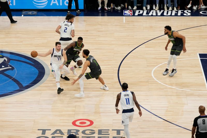 MINNEAPOLIS, MN - MAY 30: Luka Doncic #77 of the Dallas Mavericks passes the ball during the game against the Minnesota Timberwolves during Game 5 of the Western Conference Finals of the 2024 NBA Playoffs on May 30, 2024 at Target Center in Minneapolis, Minnesota. NOTE TO USER: User expressly acknowledges and agrees that, by downloading and or using this Photograph, user is consenting to the terms and conditions of the Getty Images License Agreement. Mandatory Copyright Notice: Copyright 2024 NBAE (Photo by Jordan Johnson/NBAE via Getty Images)