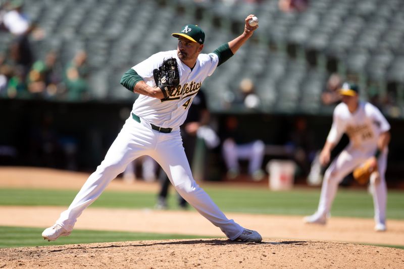 Jun 22, 2024; Oakland, California, USA; Oakland Athletics pitcher T.J. McFarland (48) delivers against the Minnesota Twins during the seventh inning at Oakland-Alameda County Coliseum. Mandatory Credit: D. Ross Cameron-USA TODAY Sports