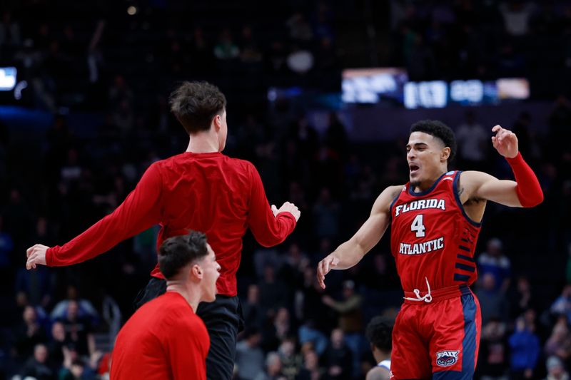 Mar 17, 2023; Columbus, OH, USA; Florida Atlantic Owls guard Bryan Greenlee (4) celebrates defeating the Memphis Tigers at Nationwide Arena. Mandatory Credit: Rick Osentoski-USA TODAY Sports