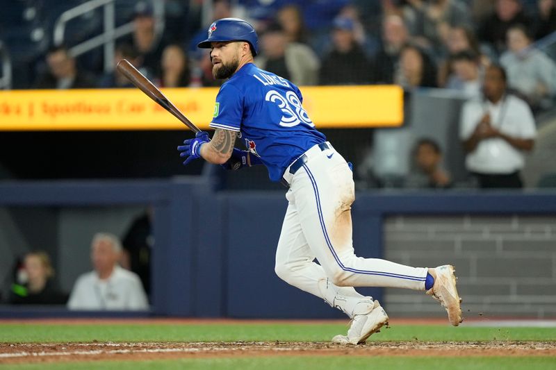 May 22, 2025; Toronto, Ontario, CAN; Toronto Blue Jays right fielder Nathan Lukes (38) hits a  walk off single during the eleventh inning against the San Diego Padres at Rogers Centre. Mandatory Credit: John E. Sokolowski-Imagn Images