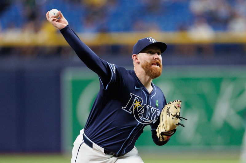 May 28, 2024; St. Petersburg, Florida, USA;  Tampa Bay Rays pitcher Zack Littell (52) throws a pitch against the Oakland Athletics in the second inning at Tropicana Field. Mandatory Credit: Nathan Ray Seebeck-USA TODAY Sports