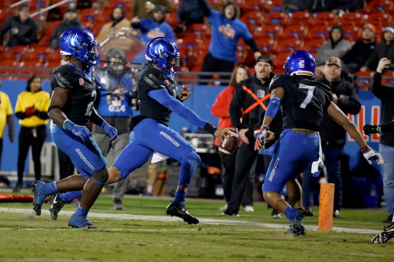 Dec 17, 2022; Frisco, Texas, USA;  Boise State Broncos quarterback Taylen Green (10) scores a touchdown against the North Texas Mean Green in the second half at Toyota Stadium. Mandatory Credit: Tim Heitman-USA TODAY Sports