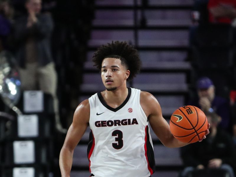 Dec 18, 2025; Athens, Georgia, USA; Georgia Bulldogs guard Jordan Ross (3) dribbles against the Western Carolina Catamounts in the second half at Stegeman Coliseum. Mandatory Credit: Mady Mertens-Imagn Images
