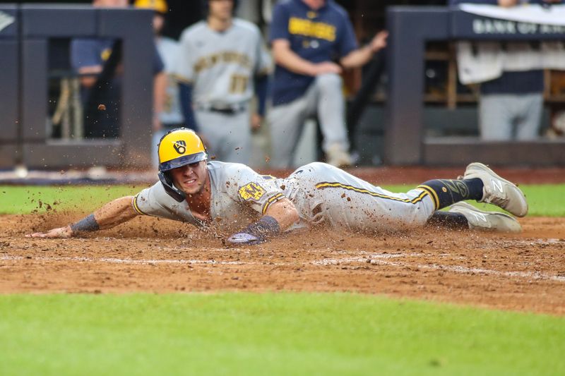 Sep 9, 2023; Bronx, New York, USA; Milwaukee Brewers center fielder Sal Frelick (10) slides safely at home in the eighth inning against the New York Yankees at Yankee Stadium. Mandatory Credit: Wendell Cruz-USA TODAY Sports