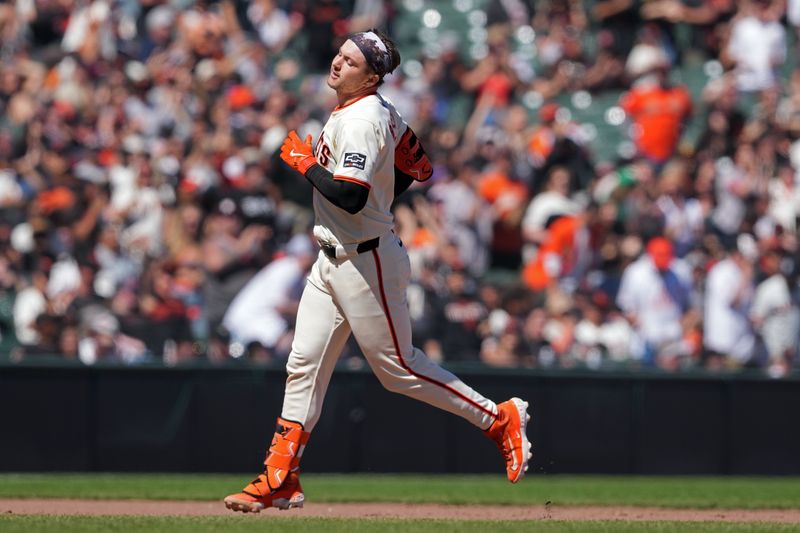 Apr 20, 2024; San Francisco, California, USA; San Francisco Giants catcher Patrick Bailey (14) reacts after hitting a ground-rule double against the Arizona Diamondbacks during the seventh inning at Oracle Park. Bailey needed a triple to hit for the cycle. Mandatory Credit: Darren Yamashita-USA TODAY Sports