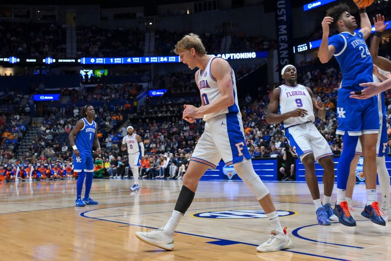 Mar 13, 2026; Nashville, TN, USA;  Florida Gators forward Thomas Haugh (10) reacts after getting fouled by Kentucky Wildcats forward Andrija Jelavic (4) during the first half at Bridgestone Arena. Mandatory Credit: Steve Roberts-Imagn Images