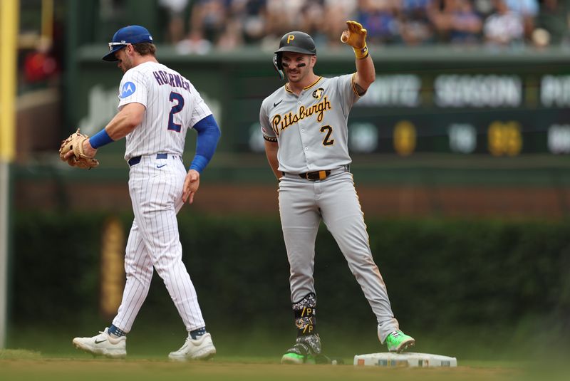 Aug 17, 2025; Chicago, Illinois, USA; Pittsburgh Pirates first baseman Spencer Horwitz (2) celebrates after hitting an RBI double during the third inning against the Chicago Cubs at Wrigley Field. Mandatory Credit: Melissa Tamez-Imagn Images