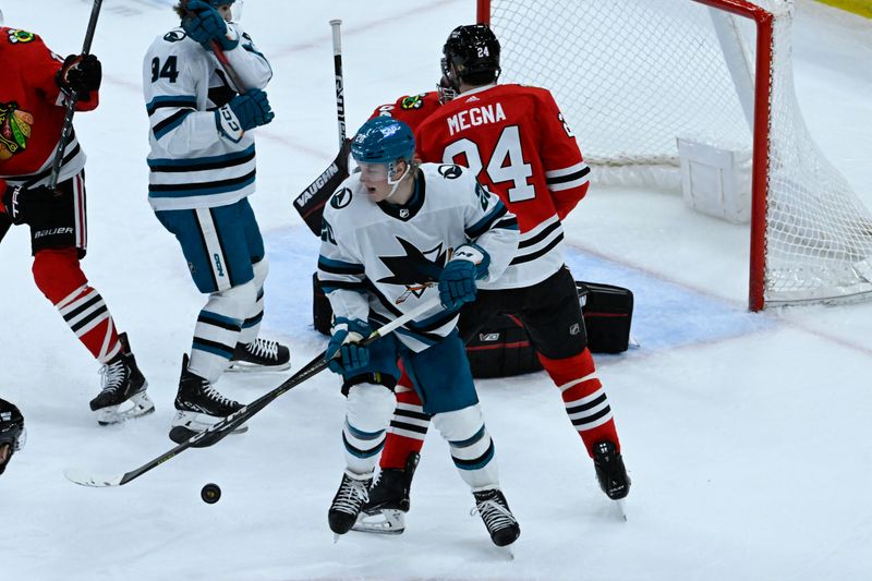 Jan 16, 2024; Chicago, Illinois, USA; San Jose Sharks left wing Fabian Zetterlund (20) chases the puck against the Chicago Blackhawks during the third period at United Center. Mandatory Credit: Matt Marton-USA TODAY Sports