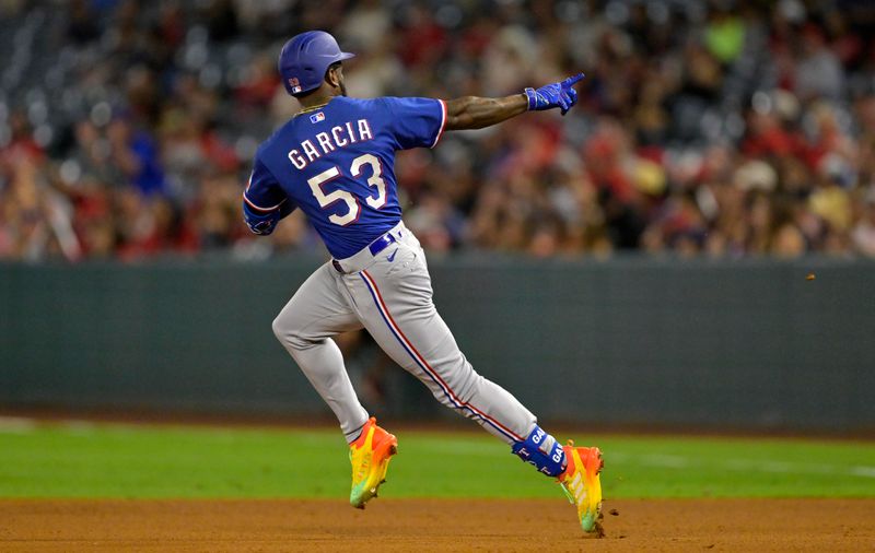 Sep 27, 2023; Anaheim, California, USA;  Texas Rangers right fielder Adolis Garcia (53) points to the dugout as he rounds the bases after a solo home run in the third inning against the Los Angeles Angels at Angel Stadium. Mandatory Credit: Jayne Kamin-Oncea-USA TODAY Sports