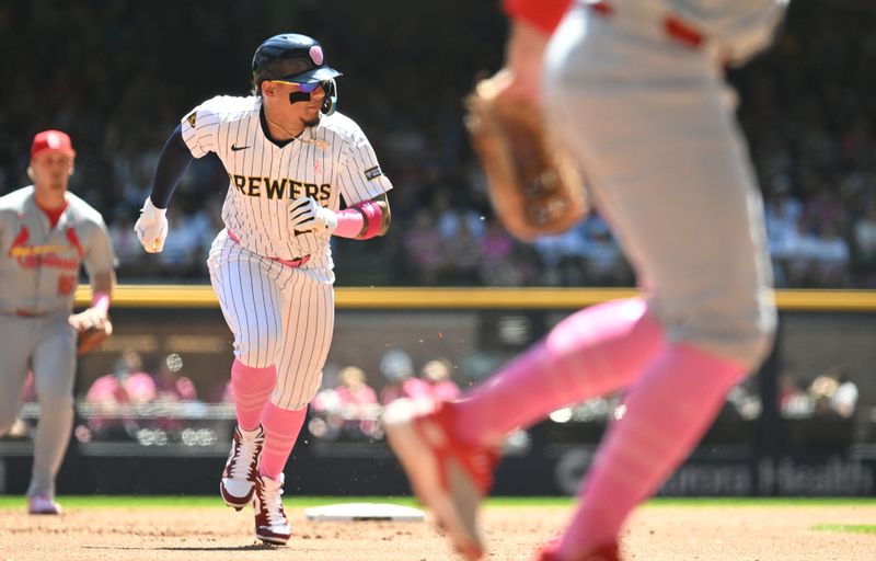 May 12, 2024; Milwaukee, Wisconsin, USA; Milwaukee Brewers catcher William Contreras (24) runs to third base against the St. Louis Cardinals in the first inning at American Family Field. Mandatory Credit: Michael McLoone-USA TODAY Sports