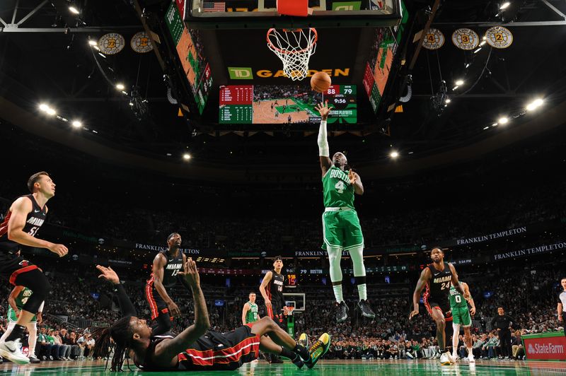 BOSTON, MA - APRIL 24: Jrue Holiday #4 of the Boston Celtics goes to the basket during the game against the Miami Heat  during Round 1 Game 2 of the 2024 NBA Playoffs on April 24, 2024 at the TD Garden in Boston, Massachusetts. NOTE TO USER: User expressly acknowledges and agrees that, by downloading and or using this photograph, User is consenting to the terms and conditions of the Getty Images License Agreement. Mandatory Copyright Notice: Copyright 2024 NBAE  (Photo by Brian Babineau/NBAE via Getty Images)