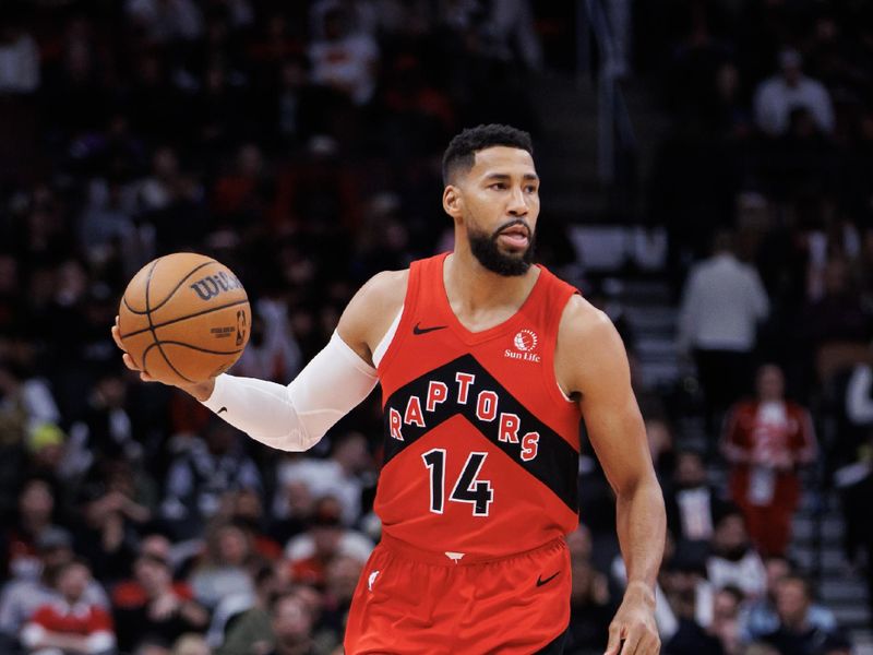 TORONTO, CANADA - JANUARY 17: Garrett Temple #14 of the Toronto Raptors brings the ball up court against the Miami Heat during the second half at Scotiabank Arena on January 17, 2024 in Toronto, Canada. NOTE TO USER: User expressly acknowledges and agrees that, by downloading and or using this photograph, User is consenting to the terms and conditions of the Getty Images License Agreement. (Photo by Cole Burston/Getty Images)