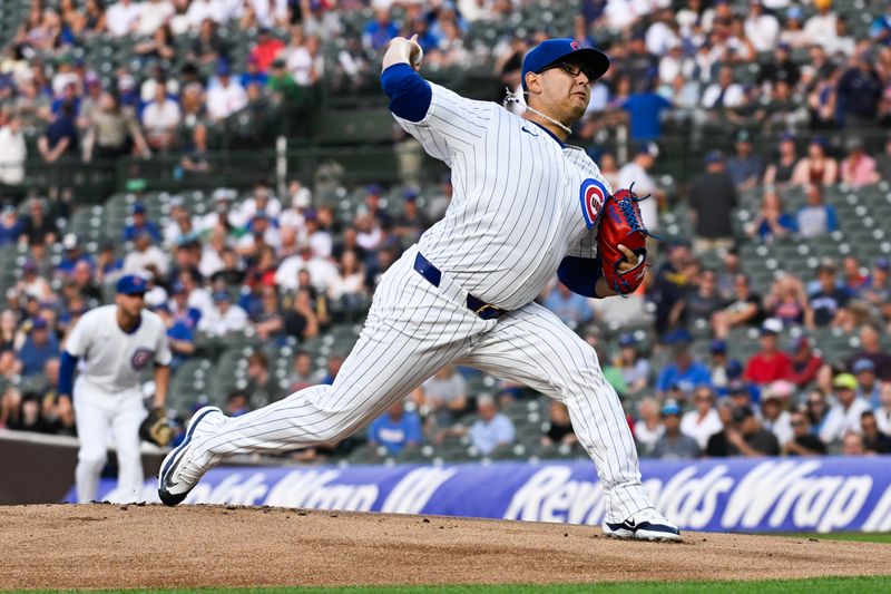 Jul 22, 2024; Chicago, Illinois, USA;  Chicago Cubs pitcher Javier Assad (72) throws against the Milwaukee Brewers during the first inningat Wrigley Field. Mandatory Credit: Matt Marton-USA TODAY Sports