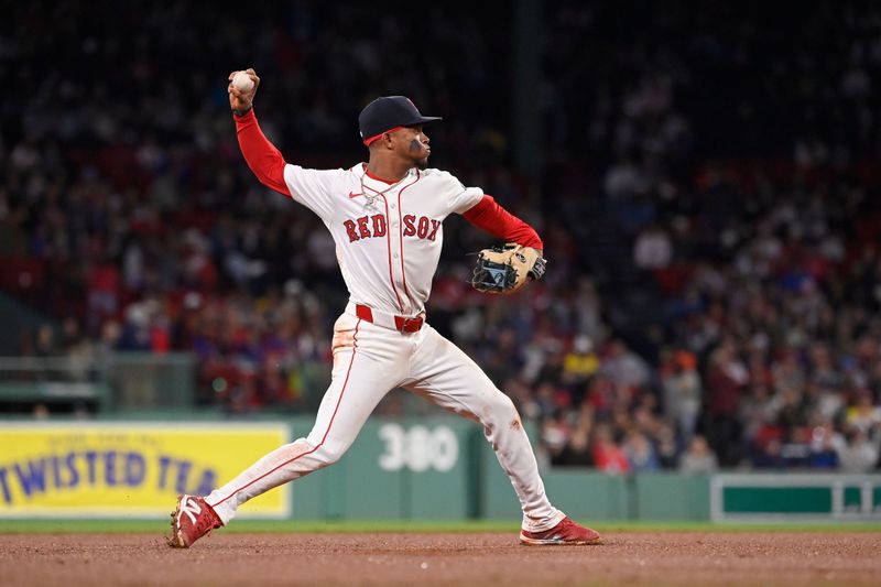 May 16, 2024; Boston, Massachusetts, USA;  Boston Red Sox shortstop Ceddanne Rafaela (43) throws the ball to first base to end the sixth inning against the Tampa Bay Rays at Fenway Park. Mandatory Credit: Eric Canha-USA TODAY Sports