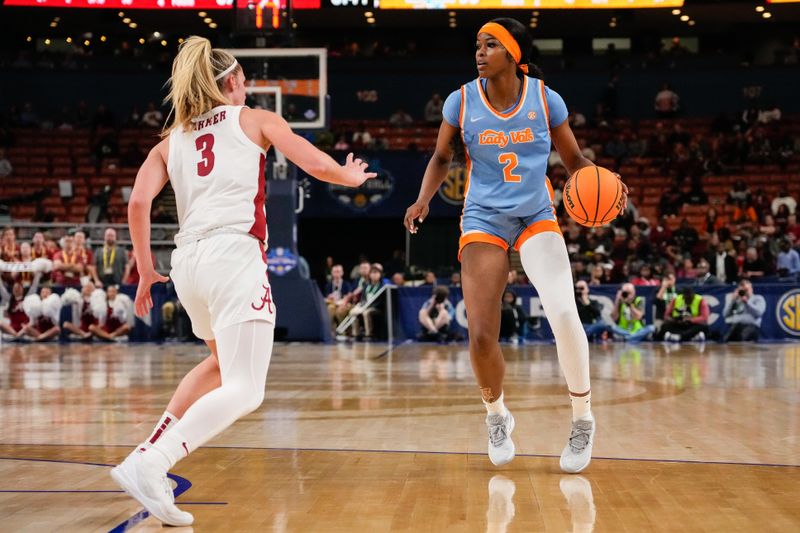 Mar 8, 2024; Greensville, SC, USA;  Tennessee Lady Vols forward Rickea Jackson (2) handles the ball against Alabama Crimson Tide guard Sarah Ashlee Barker (3) during the second half at Bon Secours Wellness Arena. Mandatory Credit: Jim Dedmon-USA TODAY Sports