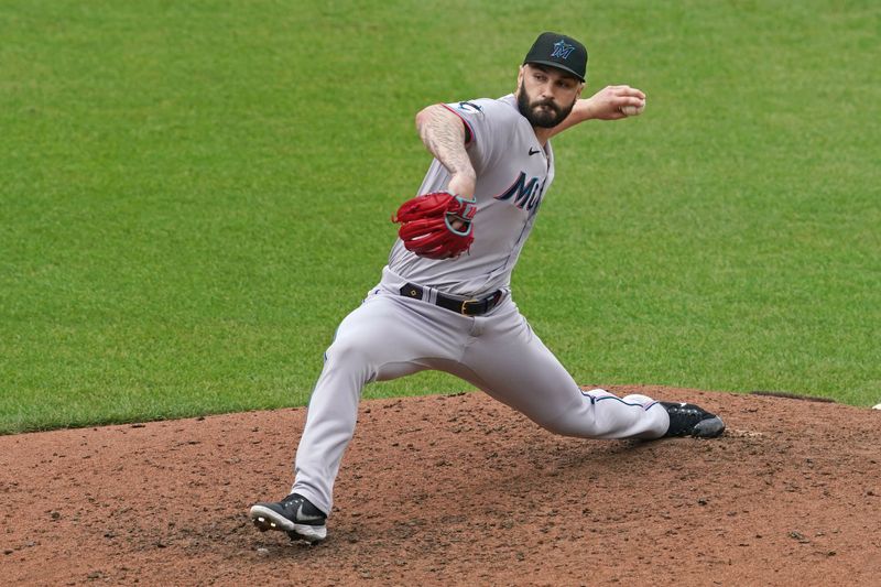 Jul 16, 2023; Baltimore, Maryland, USA; Miami Marlins pitcher Tanner Scott (66) delivers in the eighth inning against the Baltimore Orioles at Oriole Park at Camden Yards. Mandatory Credit: Mitch Stringer-USA TODAY Sports