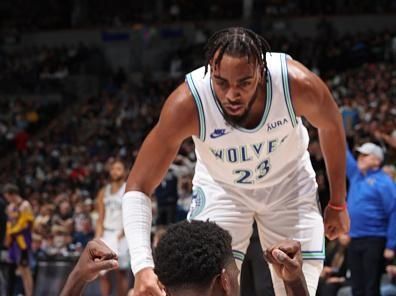 MINNEAPOLIS, MN -  DECEMBER 30: Anthony Edwards #5 of the Minnesota Timberwolves celebrates during the game against the Los Angeles Lakers on December 30, 2023 at Target Center in Minneapolis, Minnesota. NOTE TO USER: User expressly acknowledges and agrees that, by downloading and or using this Photograph, user is consenting to the terms and conditions of the Getty Images License Agreement. Mandatory Copyright Notice: Copyright 2023 NBAE (Photo by David Sherman/NBAE via Getty Images)