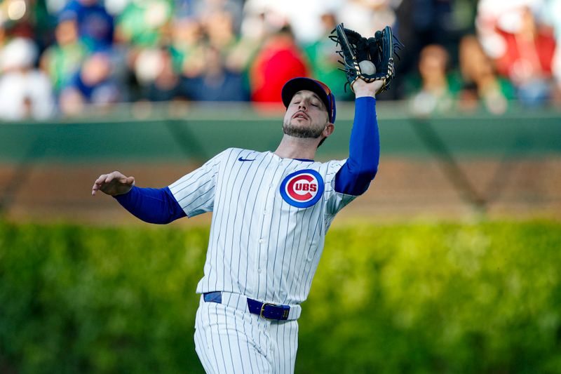 May 13, 2025; Chicago, Illinois, USA; Chicago Cubs right fielder Kyle Tucker (30) catches a fly ball hit by Miami Marlins catcher Agustín Ramírez (not pictured) during the second inning at Wrigley Field. Mandatory Credit: Kamil Krzaczynski-Imagn Images