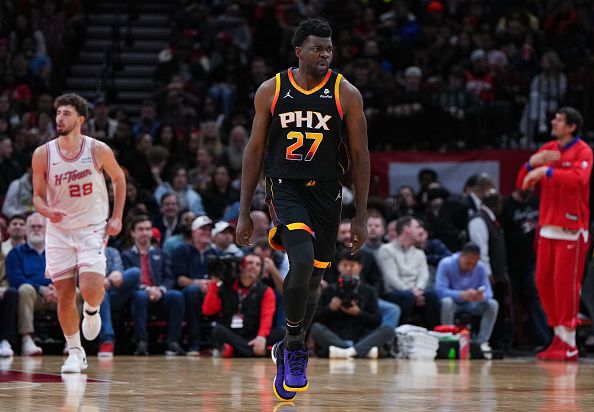 HOUSTON, TEXAS - DECEMBER 27: Udoka Azubuike #27 of the Phoenix Suns reacts after a dunk in the third quarter of the game against the Houston Rockets at Toyota Center on December 27, 2023 in Houston, Texas. User expressly acknowledges and agrees that, by downloading and or using this photograph, User is consenting to the terms and conditions of the Getty Images License Agreement. (Photo by Alex Bierens de Haan/Getty Images)