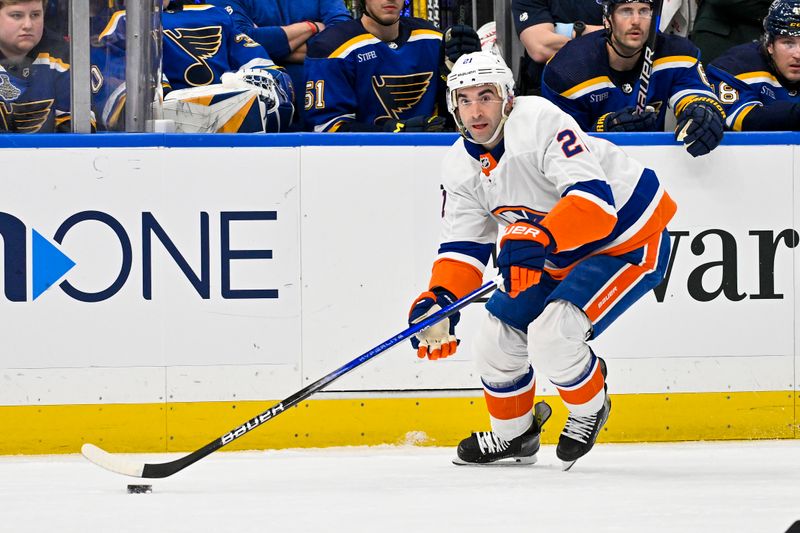 Feb 22, 2024; St. Louis, Missouri, USA;  New York Islanders center Kyle Palmieri (21) controls the puck against the St. Louis Blues during the first period at Enterprise Center. Mandatory Credit: Jeff Curry-USA TODAY Sports