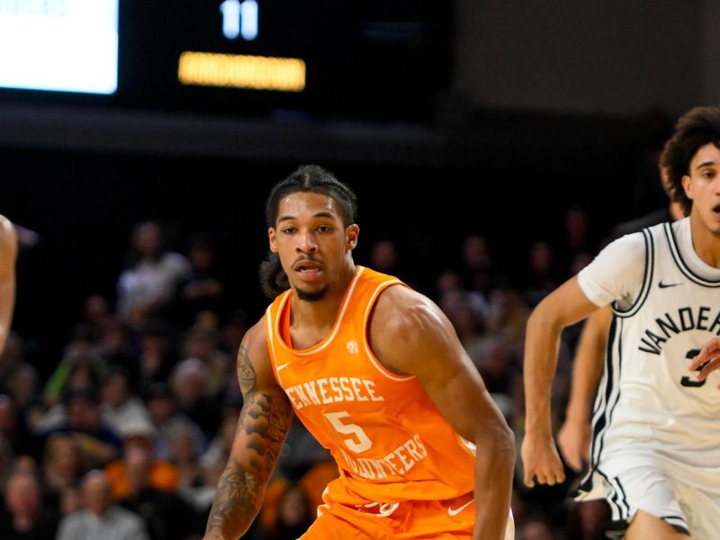 Jan 18, 2025; Nashville, Tennessee, USA;  Tennessee Volunteers guard Zakai Zeigler (5) dribbles the ball against the Vanderbilt Commodores during the second half at Memorial Gymnasium. Mandatory Credit: Steve Roberts-Imagn Images