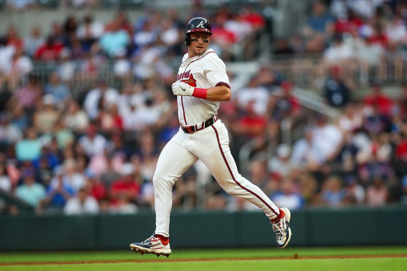 Jul 22, 2024; Atlanta, Georgia, USA; Atlanta Braves center fielder Jarred Kelenic (24) runs to second against the Cincinnati Reds in the third inning at Truist Park. Mandatory Credit: Brett Davis-USA TODAY Sports
