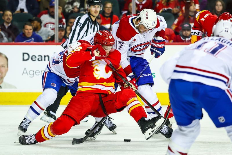 Oct 22, 2025; Calgary, Alberta, CAN; Calgary Flames left wing Joel Farabee (86) and Montreal Canadiens right wing Josh Anderson (17) battles for the puck during the second period at Scotiabank Saddledome. Mandatory Credit: Sergei Belski-Imagn Images