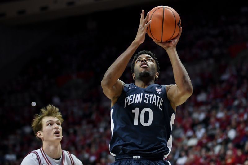 Dec 9, 2025; Bloomington, Indiana, USA; Penn State Nittany Lions forward Josh Reed (10) lays the ball in fast Indiana Hoosiers forward Reed Bailey (1) during the second half at Simon Skjodt Assembly Hall. Mandatory Credit: Robert Goddin-Imagn Images