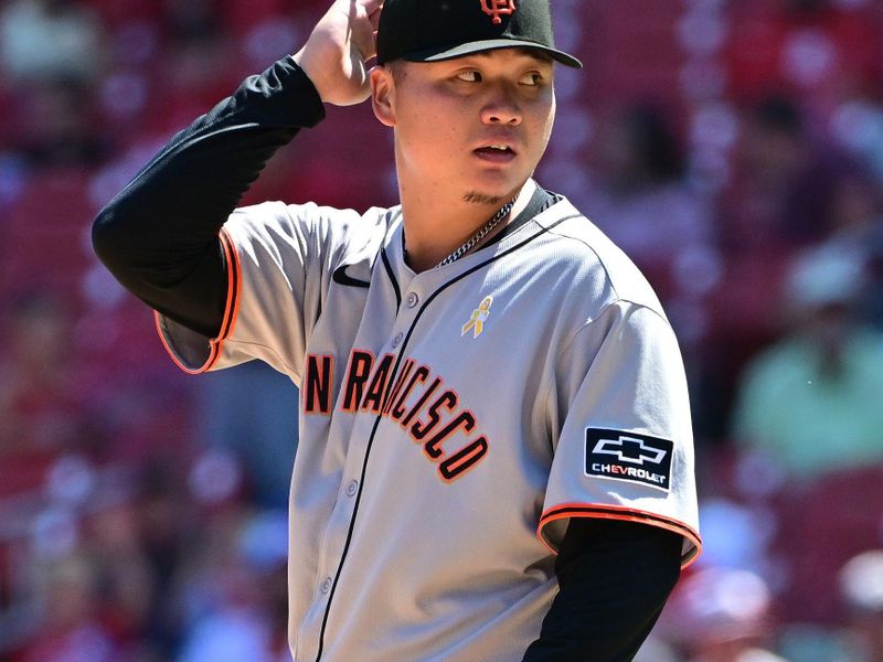 Sep 7, 2025; St. Louis, Missouri, USA; San Francisco Giants pitcher Kai-Wei Teng (66) adjusts his cap before pitching against the St. Louis Cardinals at Busch Stadium. Mandatory Credit: Tim Vizer-Imagn Images