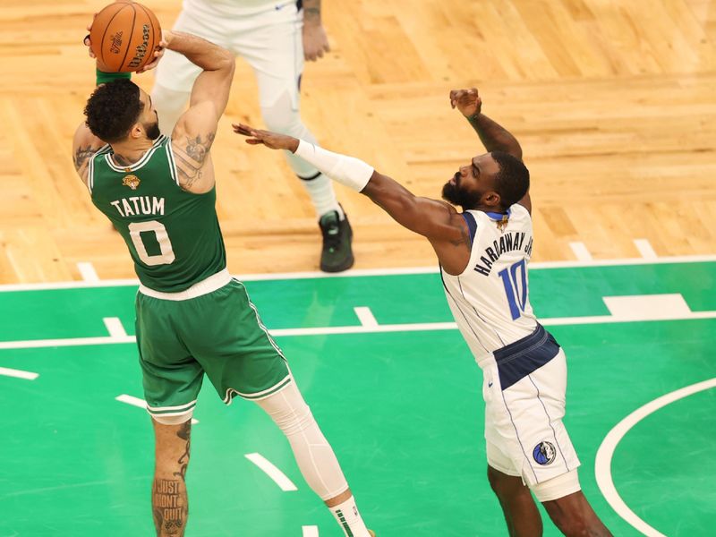 BOSTON, MA - JUNE 17: Tim Hardaway Jr. #10 of the Dallas Mavericks plays defense during the game  against Jayson Tatum #0 of the Boston Celtics during Game 5 of the 2024 NBA Finals on June 17, 2024 at the TD Garden in Boston, Massachusetts. NOTE TO USER: User expressly acknowledges and agrees that, by downloading and or using this photograph, User is consenting to the terms and conditions of the Getty Images License Agreement. Mandatory Copyright Notice: Copyright 2024 NBAE  (Photo by Stephen Gosling/NBAE via Getty Images)