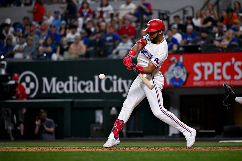 Aug 5, 2024; Arlington, Texas, USA; Texas Rangers center fielder Leody Taveras (3) drives in a run against the Houston Astros during the fifth inning at Globe Life Field. Mandatory Credit: Jerome Miron-USA TODAY Sports