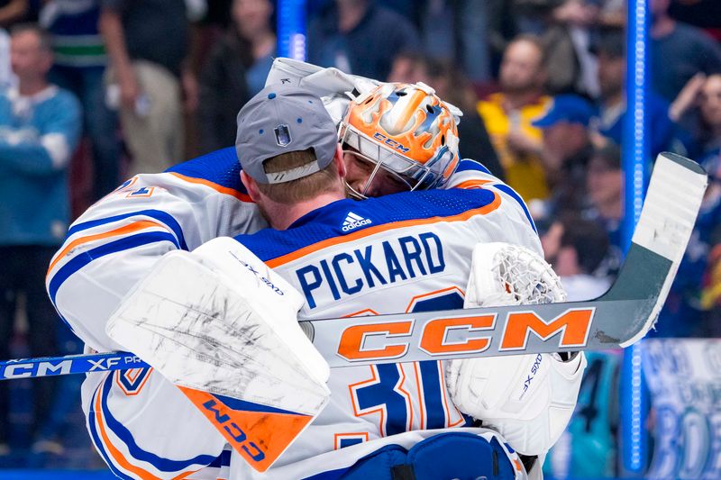 Can Edmonton Oilers' Second Period Surge Overwhelm the Vancouver Canucks?