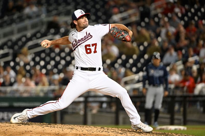 Apr 4, 2023; Washington, District of Columbia, USA; Washington Nationals relief pitcher Kyle Finnegan (67) throws to the Tampa Bay Rays during the ninth inning at Nationals Park. Mandatory Credit: Brad Mills-USA TODAY Sports