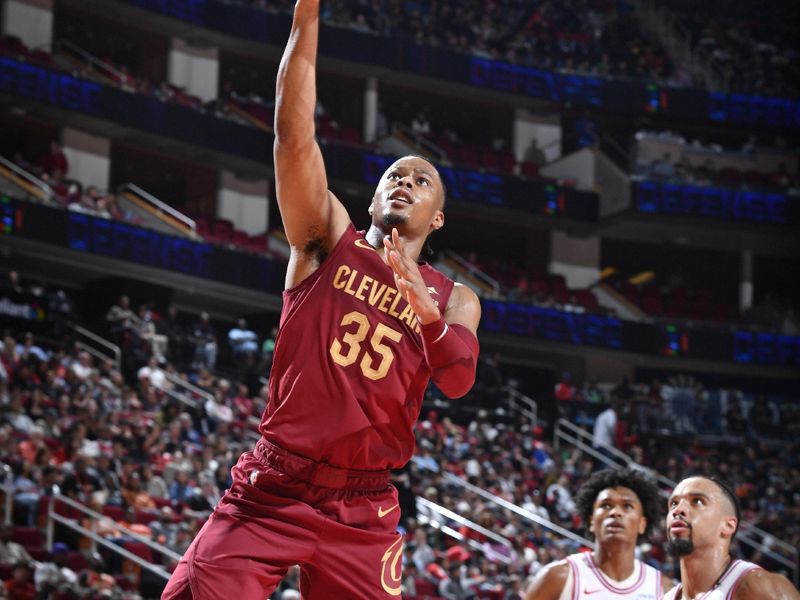 HOUSTON, TX - MARCH 16:  Isaac Okoro #35 of the Cleveland Cavaliers shoots the ball during the game against the Houston Rockets on March 16, 2023 at the Toyota Center in Houston, Texas. NOTE TO USER: User expressly acknowledges and agrees that, by downloading and or using this photograph, User is consenting to the terms and conditions of the Getty Images License Agreement. Mandatory Copyright Notice: Copyright 2024 NBAE (Photo by Logan Riely/NBAE via Getty Images)