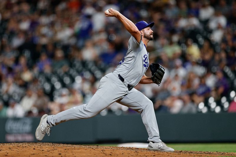 Jun 17, 2024; Denver, Colorado, USA; Los Angeles Dodgers relief pitcher J.P. Feyereisen (45) pitches in the ninth inning against the Colorado Rockies at Coors Field. Mandatory Credit: Isaiah J. Downing-USA TODAY Sports