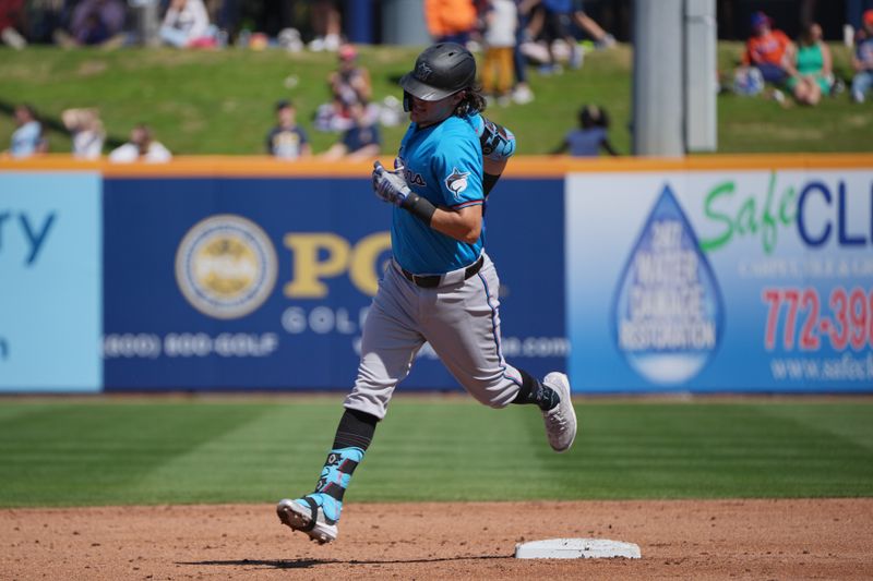 Feb 27, 2024; Port St. Lucie, Florida, USA;  Miami Marlins shortstop Tristan Gray (59) rounds the bases after hitting a solo home run against the New York Mets at Clover Park. Mandatory Credit: Jim Rassol-USA TODAY Sports