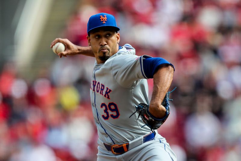 Apr 7, 2024; Cincinnati, Ohio, USA; New York Mets relief pitcher Edwin Diaz (39) pitches against the Cincinnati Reds in the ninth inning at Great American Ball Park. Mandatory Credit: Katie Stratman-USA TODAY Sports